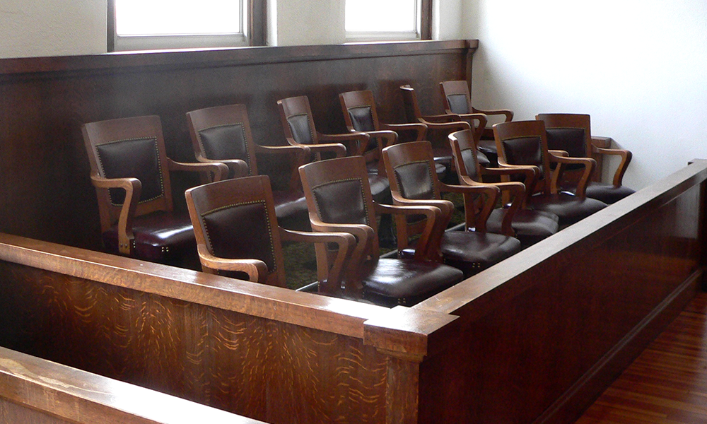 empty jury box in a courtroom