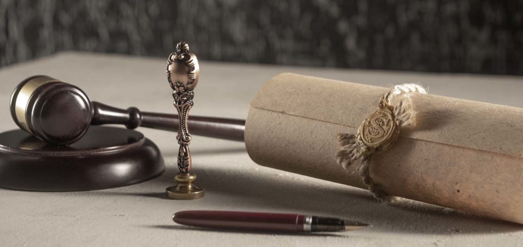 old legal scroll and gavel