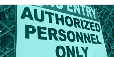 Authorized Personnel Only sign in a workplace
