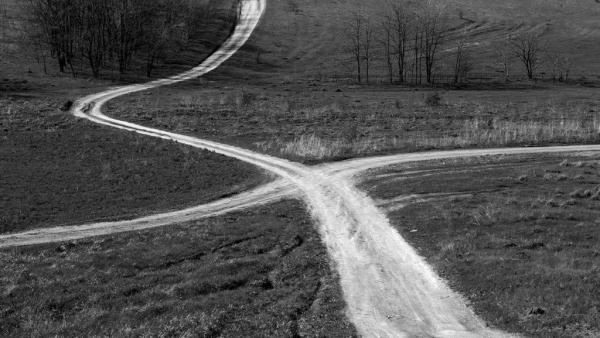 a crossroads in a field