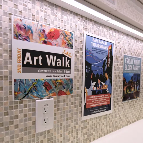 Community event posters in break room